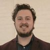 Portrait of Jake Kucek, Assistant Professor at John Carroll University