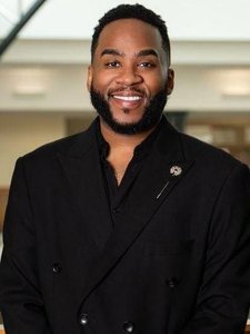 Portrait of John Paul Robinson, Director for Institutional Compliance and Campus Belonging at John Carroll University
