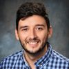 Portrait of Marius Mihai, Assistant Professor at John Carroll University