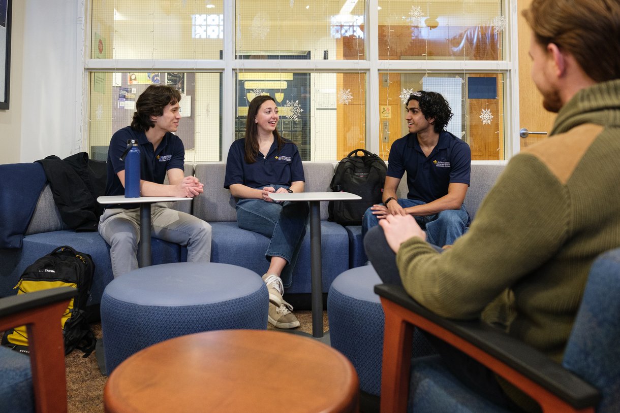 Students talking together in a campus lounge