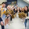 Group Young People Cheer Smile Holding Blue Gold