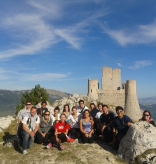Group of students who participated in the Vatican City fall program, atop Rocca Calascio, a mountaintop fortress or rocca in the Province of L'Aquila in Abruzzo, Italy.
