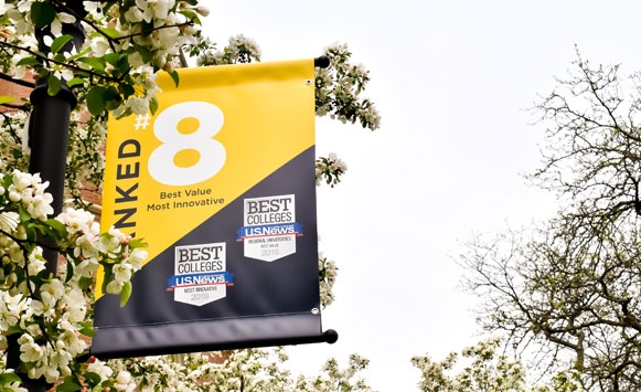 Picture of a pole banner on campus highlight John Carroll University's #8 ranking for Best Value and #8 Most Innovative Schools in U.S. News & World Report's 2019 Regional Universities Midwest region