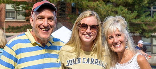 Parents at Homecoming & Family Weekend tailgate with their student